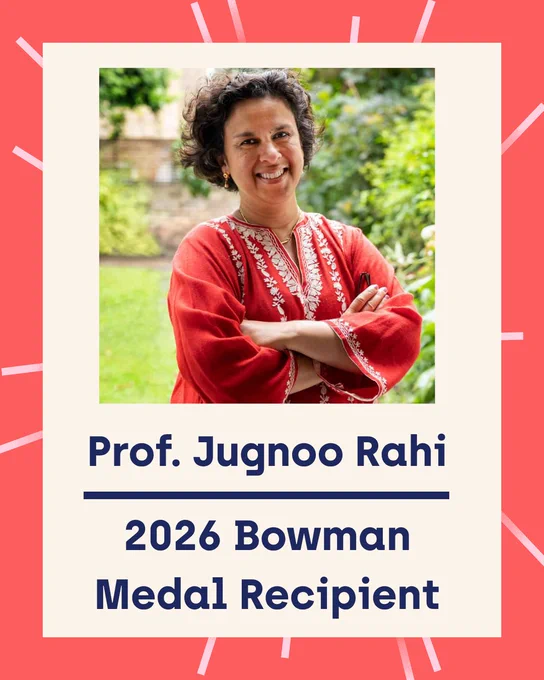 Social media graphic featuring Prof. Jugnoo Rahi standing with her arms folded, wearing an orange top with embroidered detailing and smiling at the camera. The portrait is framed within a beige panel on a red background with decorative lines. Below the image, the text reads: “Prof. Jugnoo Rahi 2026 Bowman Medal Recipient.”