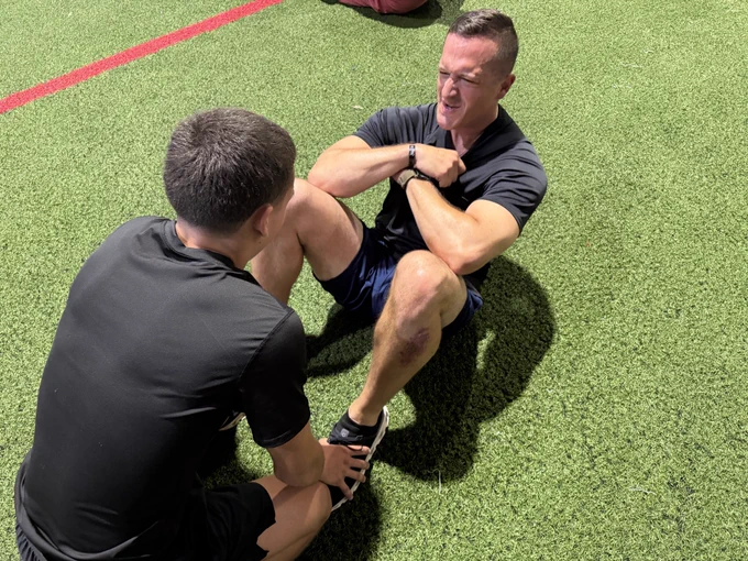 Applicants doing sit ups