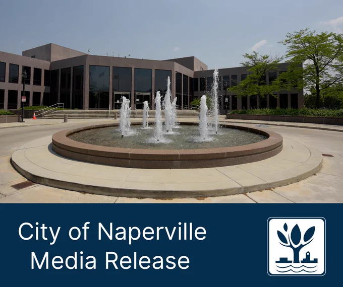 A water fountain in front of the entrance to the City of Naperville Municipal Center with the City of Naperville logo and the words: "City of Naperville Media Release."