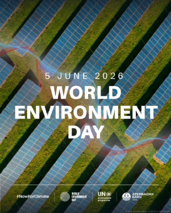 Aerial view of solar-panel arrays on a green field with text World Environment Day, 5 June 2026