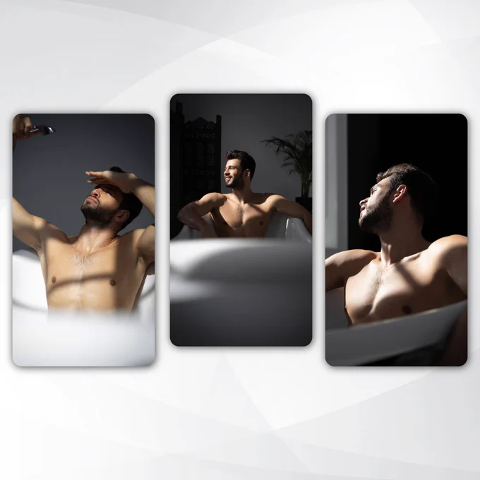 A high-contrast portrait: a man with dark hair and a beard leans back in a white bathtub, dramatic sunlight and shadows sculpting his physique. The intersection of light and form creates a timeless silhouette.