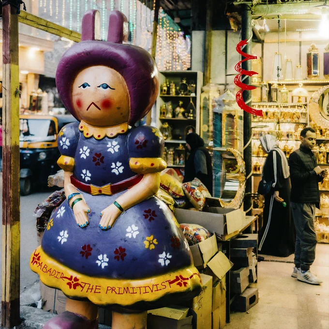 Abadir cover The Primitivist, featuring a big wooden doll painted with the artist and album title.