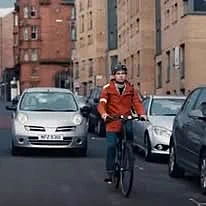 Image of a cyclist of a main road.