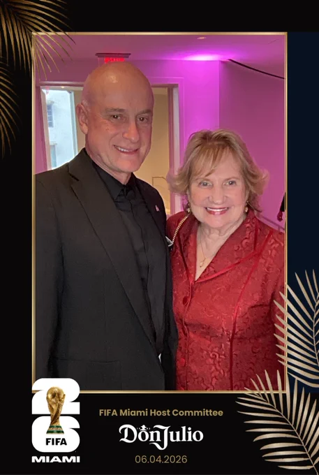Framed photo: Two adults smile for the camera, Francois Sainfort, Ph.D. and Virginia Jacko.
At the bottom of the frame, is the FIFA World Cup Miami Logo and the text: 
FIFA Miami Host Committee 
Don Julio 
06.04.2026