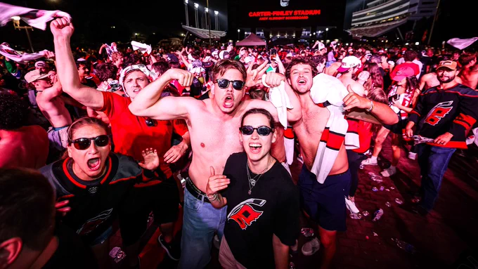 Photo of the Caniacs outside tarps off 
