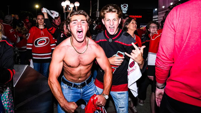 Photo of the Caniacs outside tarps off 