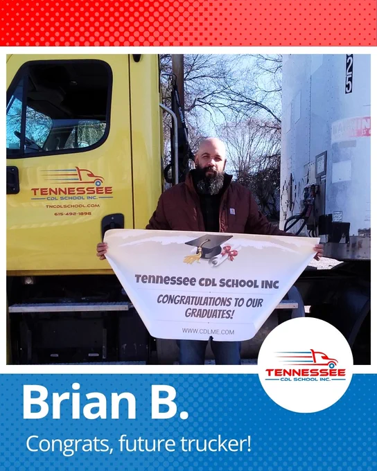 Graduate holding a congratulatory banner in front of a Tennessee CDL School yellow truck, celebrating trucking success.