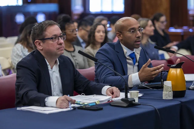 Photo of NYC Health Commissioner, Dr. Alister F. Martin testifying to New York City Council Committee on Health.