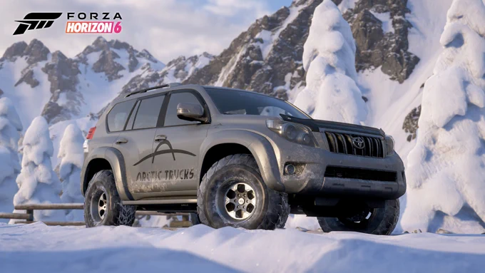 A rugged, off-road vehicle is parked in a snowy, mountainous landscape. The vehicle has "Arctic Trucks" branding on the side. The scene features tall snow-covered peaks under a clear sky. "Forza Horizon 6" is displayed in the top left corner.
