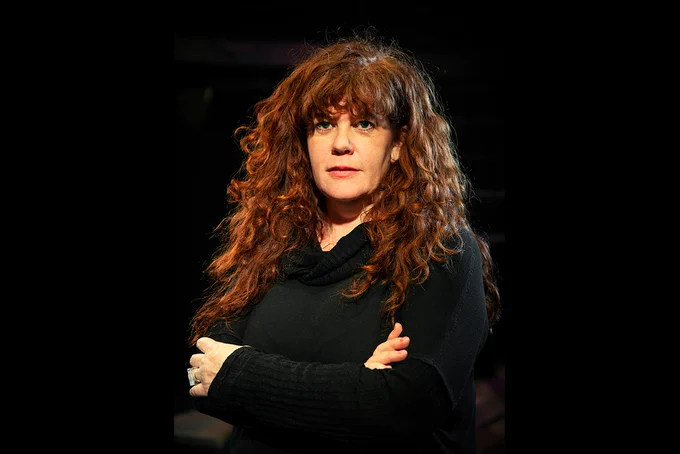 Heather Gilbert wearing black with arms crossed