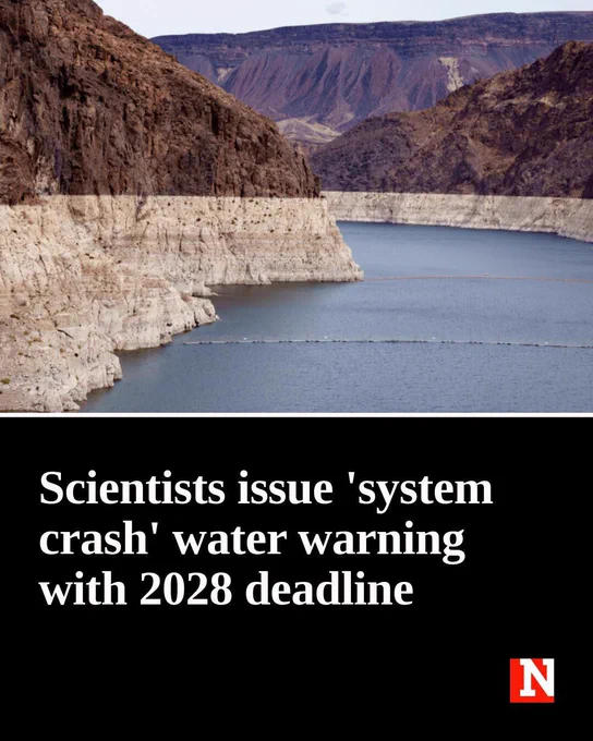 News graphic showing a reservoir surrounded by steep rocky canyon walls with a visible white “bathtub ring” marking significantly lower water levels. Large text reads: “Scientists issue ‘system crash’ water warning with 2028 deadline.” A news outlet logo appears in the lower-right corner. The graphic highlights concerns about worsening water shortages and warnings from scientists about potential failures in water systems if current trends continue.