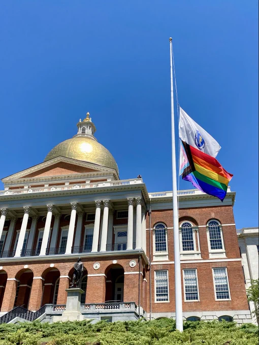 Pride Flag waving outside the State House
