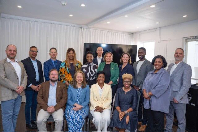 A photo of Commissioner Knight with business leaders, Global NY personnel, and local electeds in the Carribean.