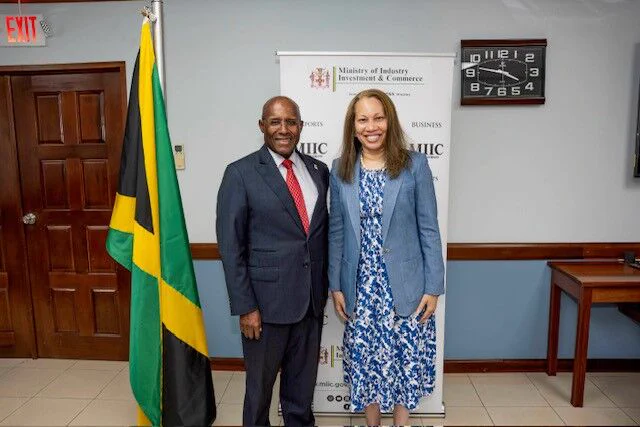 Commissioner Knight meets with a representative in Jamaica.