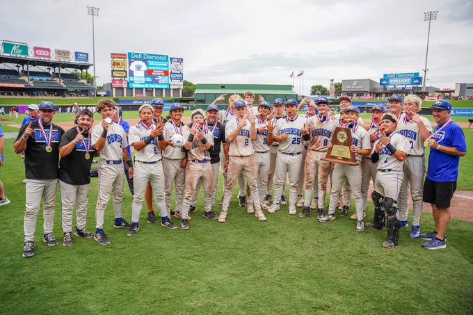 Robinson team and coaches pose with championship trophy.