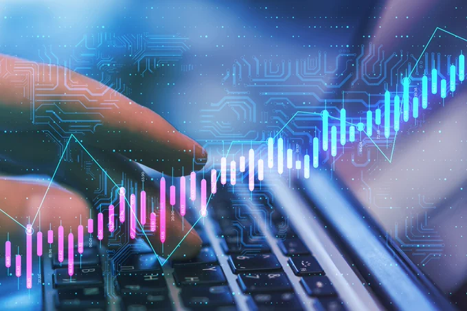 Algorithmic trading concept with virtual screen with growing stock market candlestick and circuit at laptop with hands background. 