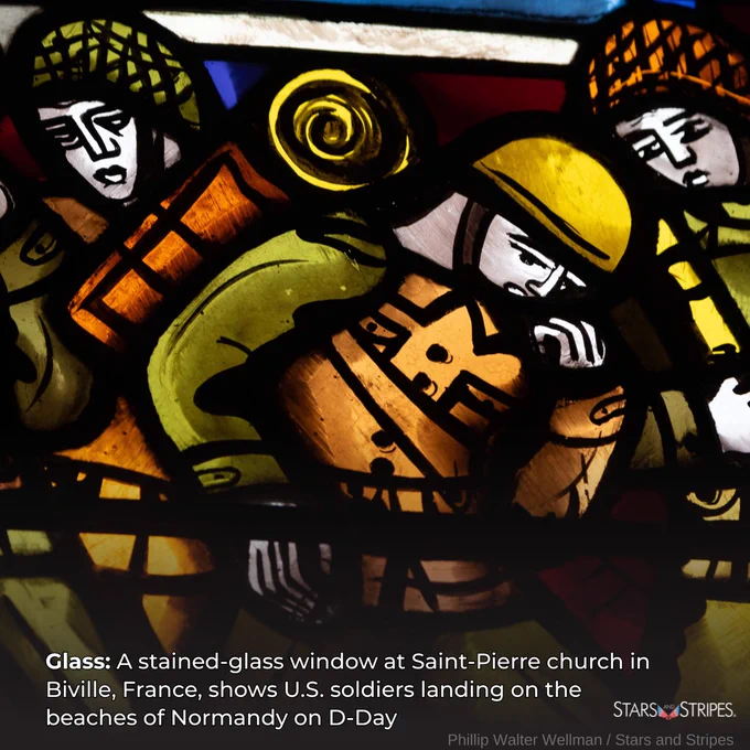 Stained glass that depicts WWII soldiers. White text reads: Glass: A Stained-glass window at Saint-Pierre church in Biville, France, shows U.S. soldiers landing on the beaches of Normandy on D-Day; white Stars and Stripes logo; photo credit: Phillip Walter Wellman/Stars and Stripes