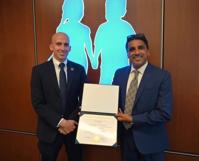 A photo at Children's Wisconsin where Dr. Narang received an FBI Director's Certificate for work on a case that resulted in the life sentencing of a Michigan man.