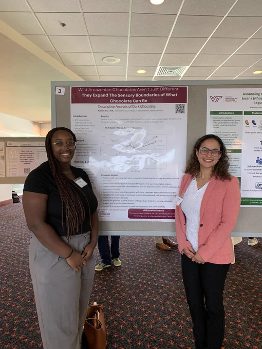M.S. graduate Elissa Hall (left) and Dr. Renata Carneiro (right) with Elissa's research poster, titled “Wild‑Amazonian Chocolates Aren’t Just Different - They Expand The Sensory Boundaries of What Chocolate Can Be."
