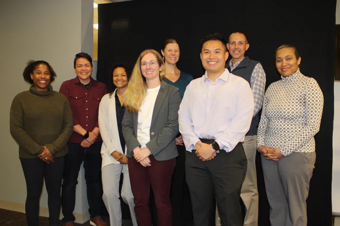 AFHSD leadership with residents.