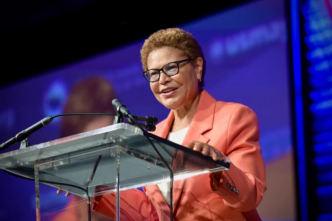 Los Angeles Mayor Karen Bass speaking at a podium.
