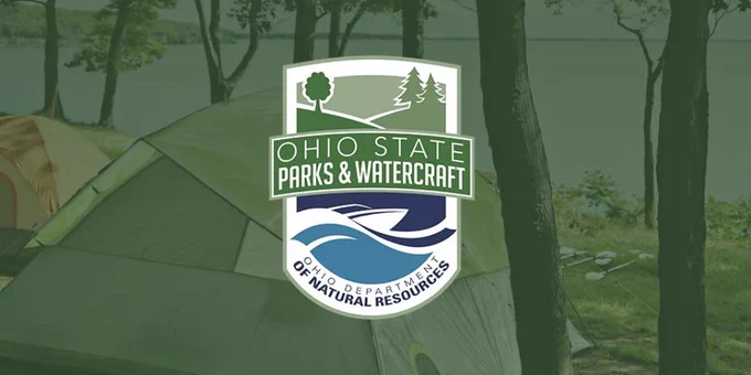 Ohio Department of Natural Resources Ohio State Parks & Watercraft logo overlaid on top of a photo of two tents in front of a lake.