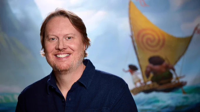 Don Hall standing in front of Moana backdrop 