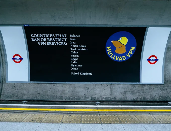 An image pointing towards the side of the Bank London underground station.

The image shows a black background with white text which reads:

"Countries that ban or restrict VPN services:"

Followed by a list of countries: Belarus, Iran, Iraq, North Korea, Turkmenistan, China, Russia, Egypt, India, Myanmar, Oman, United Kingdom?

United Kingdom is written at the end with a question mark afterwards.

Top right corner is the Mullvad VPN logo in a purple circle.