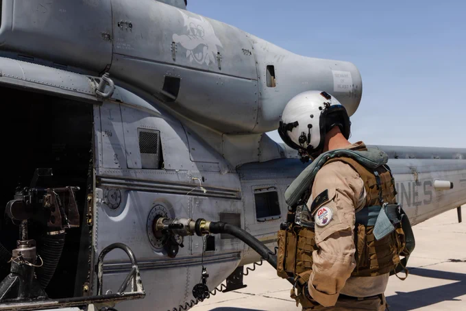 A U.S. Marine assigned to Marine Medium Tiltrotor Squadron\u202F(VMM)\u202F364 (Reinforced), 13th Marine Expeditionary Unit, observes a UH-1Y Venom refuel during aviation delivery ground refueling training in support of a raid during Realistic Urban Training at Marine Corps Air Station Yuma, Arizona, May 28, 2026. RUT is a critical pre-deployment exercise that enables the 13th MEU to integrate its command, air,\u202Fground\u202Fand\u202Flogistics\u202Fcombat elements, ensuring the force is prepared to respond rapidly and effectively to crises in unfamiliar, urban environments.\u202F(U.S. Marine Corps photo by Lance Cpl. Fernando Cruz Martinez)\n\n