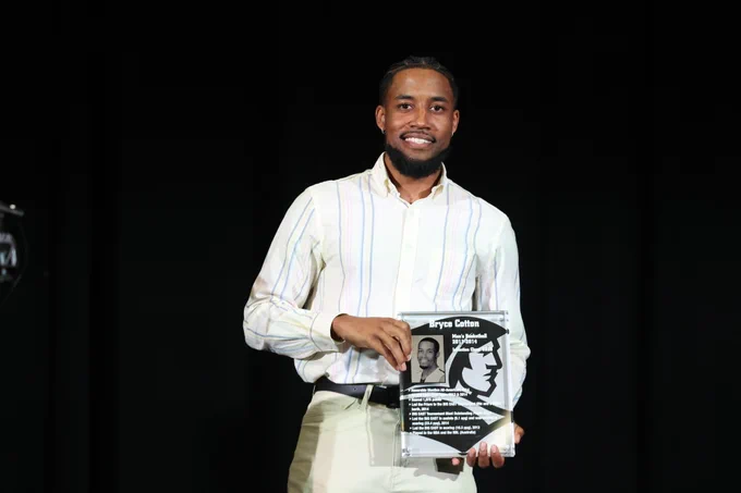 Bryce Cotton with his Hall of Fame plaque