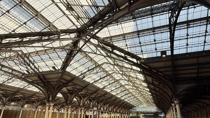 View towards Exchange Square from inside the station. Roof is visible with its new glazing panels. Light is streaming in.