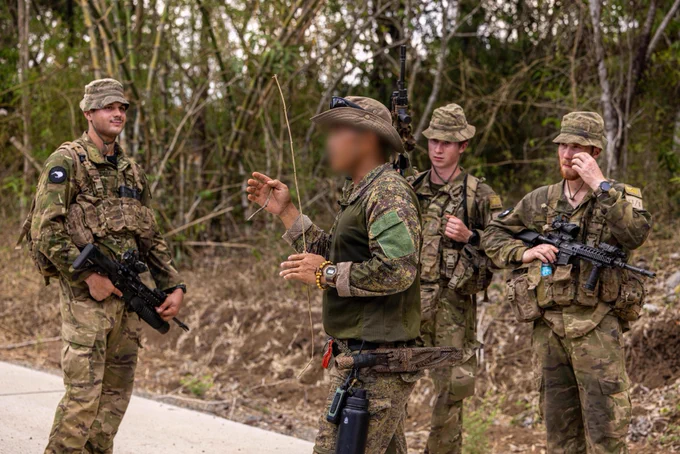 A Philippine Army soldier, center, assigned to the Special Forces Regiment (Airborne), teaches the jungle tracking course during Salaknib 2026 at Fort Magsaysay, Philippines, May 26, 2026.