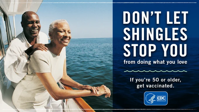 Two older adults enjoying a boat ride with a message encouraging shingles vaccination for those 50 and older by CDC.