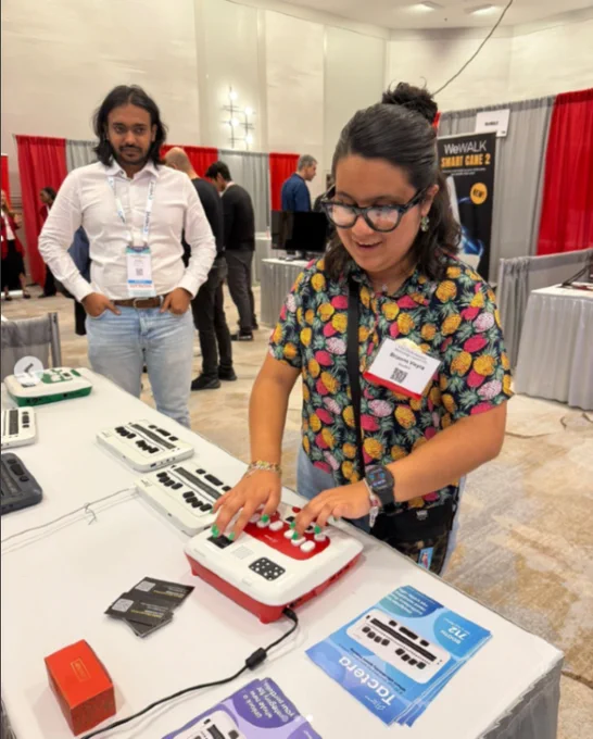CSUN 2026 attendees are engaging with the Tactera at a booth in the exhibitor hall.