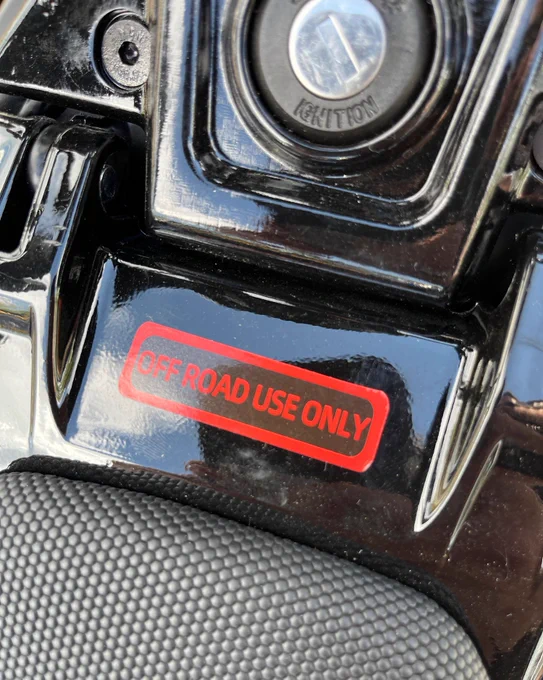 Emoto with “off road use only” stamp 