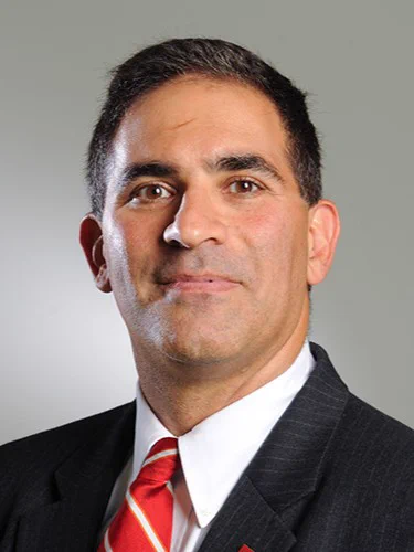 Chancellor J's headshot with NC State, former faculty member and department head in the College of Engineering
