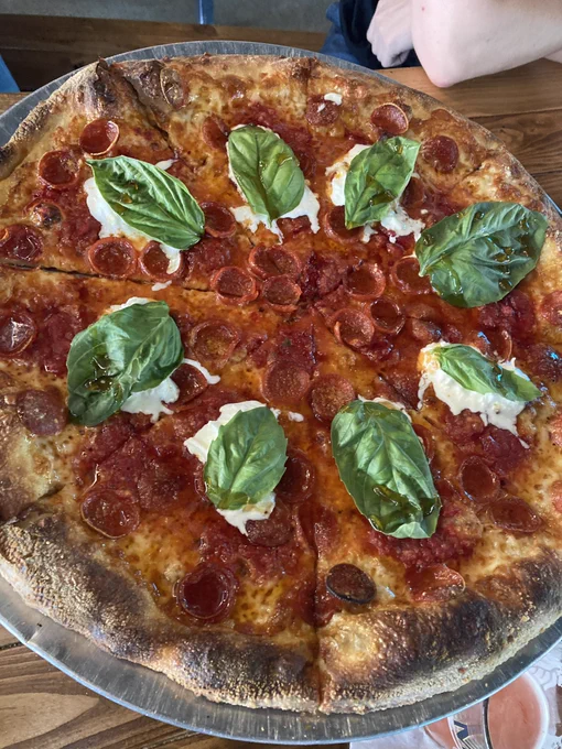 The Bonfire pizza with Pepperoni, creamy burrata, fresh basil and drizzled with hot honey
