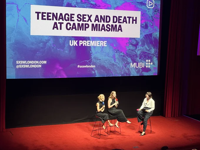 Gillian Anderson and Hannah Einbinder on stage doing a Q&A