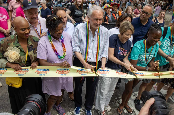 Senator Markey cuts into a ribbon alongside Governor Healey, City Councilor Louijeune, and Congresswoman Pressley