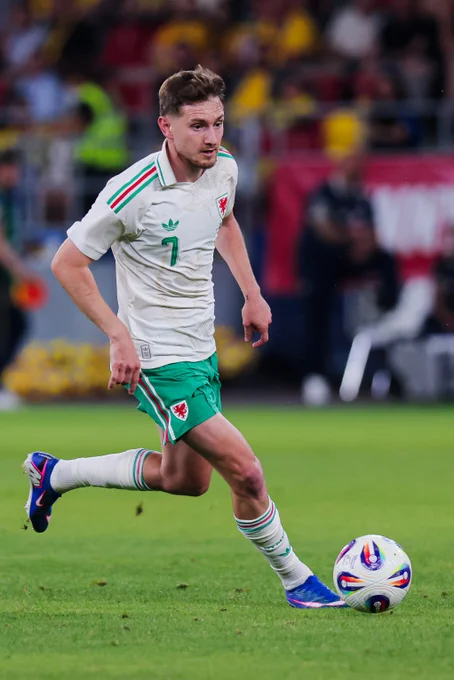 David Brooks in action for Wales against Romania