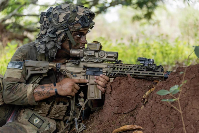 U.S. Army Sgt. Ford Silas, an infantryman assigned to 2nd Battalion, 35th Infantry Regiment, 3rd Mobile Brigade, 25th Infantry Division, scans for opposing forces during the Joint Pacific Multinational Readiness Center Exportable Exercise at Fort Magsaysay, Nueva Ecija, Philippines, May 19, 2026.