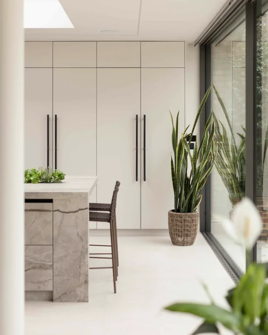Minimalist kitchen with stone-effect kitchen island 