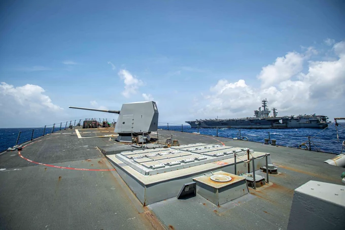 Arleigh Burke-class guided-missile destroyer USS Gridley (DDG 101) steams alongside Nimitz-class aircraft carrier USS Nimitz (CVN 68) during an air and sea power demonstration in the Atlantic Ocean, May 30, 2026. Gridley is deployed with Nimitz Carrier Strike Group as part of Southern Seas 2026 which seeks to enhance capability, improve interoperability, and strengthen maritime partnerships with countries throughout the region through joint, multinational, and interagency exchanges and cooperation. (U.S. Navy photo by Mass Communication Specialist Seaman Frankie M. Guage)
