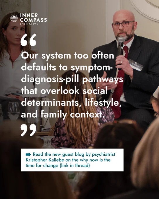 - Background image:
Photo of Dr Kristopher Kaliebe in a black suit and red tie holding a microphone and talking in a panel at MAHA event of May 4, 2026.

- Text overlay—quote text:
"Our system too often defaults to symptom-diagnosis-pill pathways that overlook social determinants, lifestyle, and family context."

- Text overlay—call to action box:
"Read the new guest blog by psychiatrist Kristopher Kaliebe on the why now is the time for change (link in thread)"