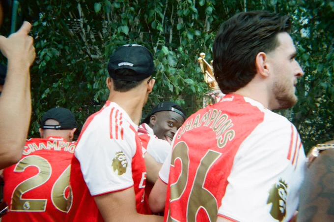 Disposable camera shot of the Arsenal players on the bus during the trophy parade