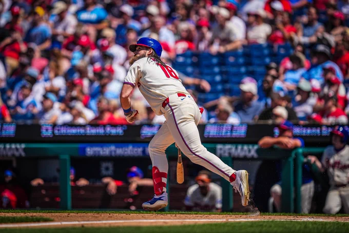 Brandon Marsh runs out of the batter's box after his home run swing.