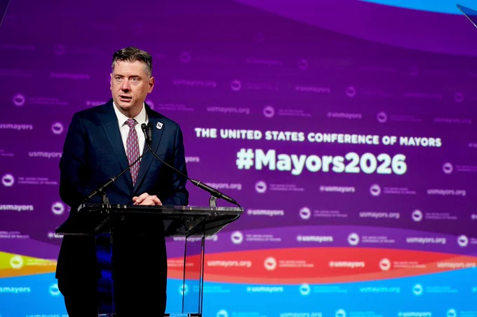 Oklahoma City Mayor David Holt speaking at a podium on stage.