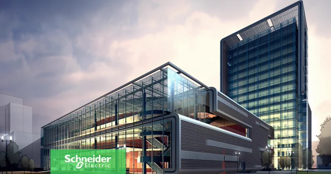 Ein moderner, kantiger Geb\u00E4udekomplex aus Glas und Stahl vor einem bew\u00F6lkten Himmel. Der architektonische Stil ist klar und zeitgem\u00E4\u00DF.