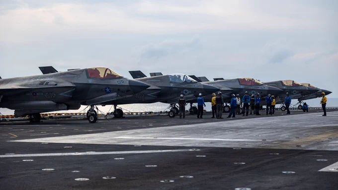 U.S. Marine Corps F-35B Lightning II assigned to Marine Fighter Attack Squadron (VMFA) 122, 11th Marine Expeditionary Unit, are staged on the flight deck aboard Wasp-class amphibious assault ship USS Boxer (LHD 4) in the South China Sea, June 1, 2026. The 11th MEU, embarked aboard the Boxer Amphibious Ready Group, is a persistent, combat credible force contributing to deterrence and crisis response in the U.S. 7th Fleet area of operations. U.S. 7th Fleet, the U.S. Navy's largest forward-deployed numbered fleet, routinely interacts and operates with allies and partners to preserve a free and open Indo-Pacific. (U.S. Marine Corps photo by Lance Cpl. Nicole Stuart)