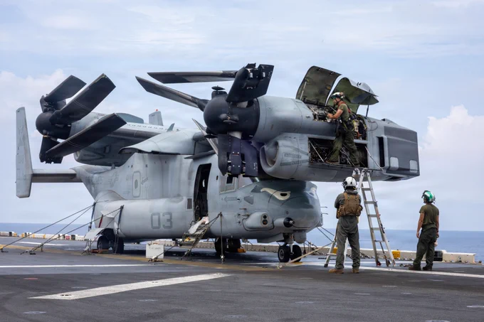 U.S. Marines assigned to Marine Medium Tiltrotor Squadron (VMM) 163 (Reinforced), 11th Marine Expeditionary Unit, perform maintenance on an MV-22B Osprey on the flight deck of Wasp-class amphibious assault ship USS Boxer (LHD 4), May 31, 2026. Boxer, flagship of the Boxer Amphibious Ready Group, is underway with the 11th MEU in the U.S. 7th Fleet area of operations. U.S. 7th Fleet, the Navy’s largest forward-deployed numbered fleet, routinely interacts and operates with allies and partners to preserve a free and open Indo-Pacific. (U.S. Navy photo by Mass Communication Specialist Seaman Trace Gorsuch)